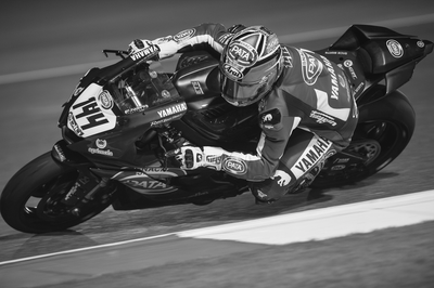 MotoGP Rider and Bike leaning into a turn